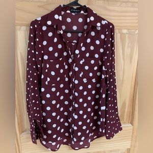 Polka dot button up blouse.